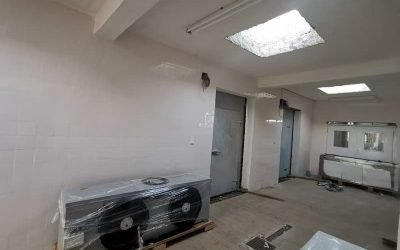 large commercial kitchen build with energy-saving appliances and high-efficiency systems